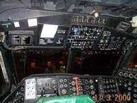 The main instrument panel of the cockpit. More detail of the various instruments is available in the Cockpit Tour page which comes next in the tour, but a brief run through of the systems from top left to bottom right, starting with the overhead panel, is:<br><br>Fuel system, Electronic System; Flight control position indicators, Directional equipment, Propeller pitch, Main Engine instruments (turbine RPM, compressor RPM, exhaust gas temperature), Hydraulic system, Gearbox statuses.