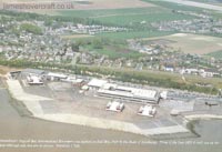 Aerial shot of the hoverpad and three SRN4 Mk II craft operating with Hoverlloyd on the pad, one in maintenance